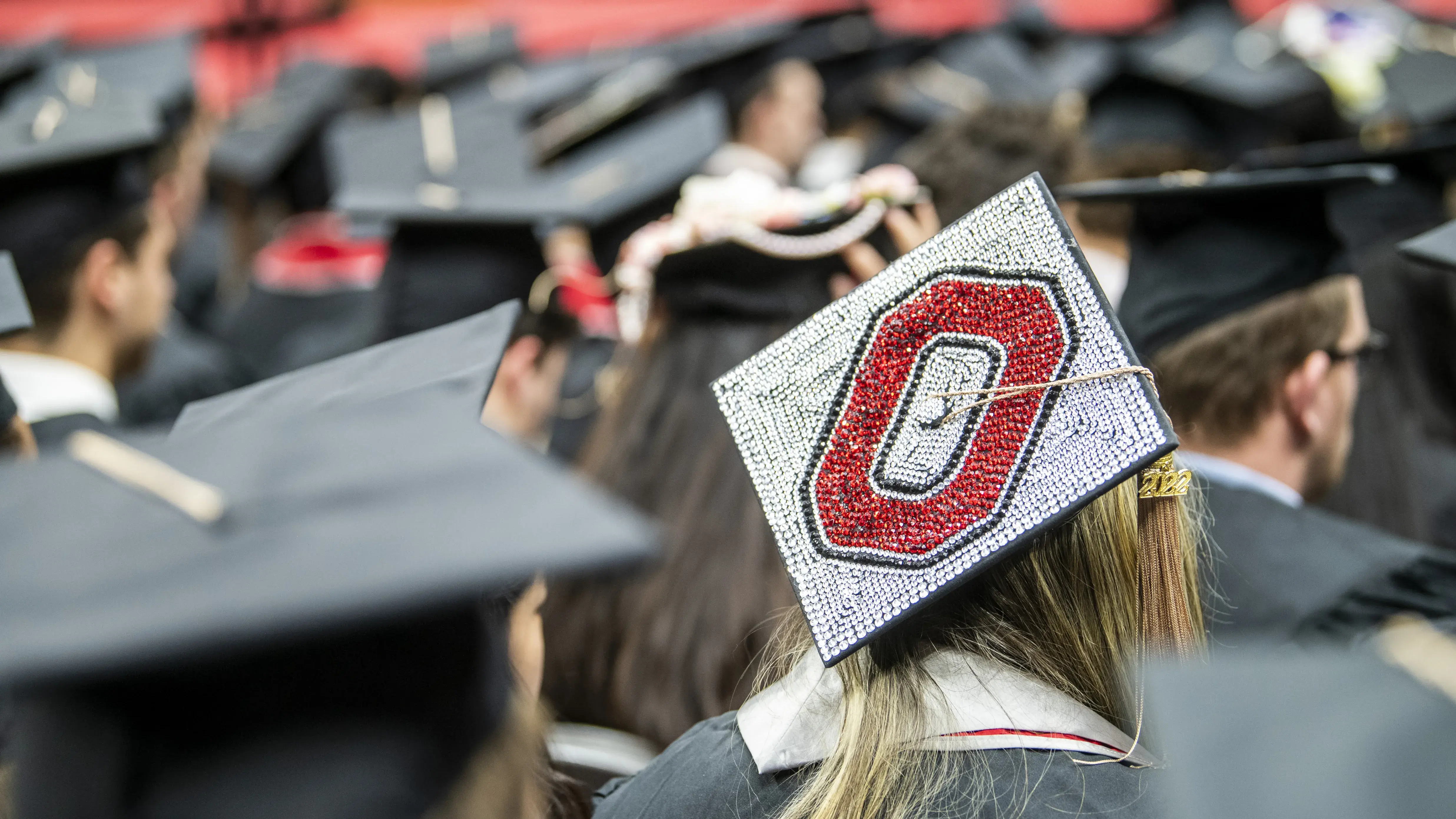 An Ohio State student graduation cap bedazzled with the block o