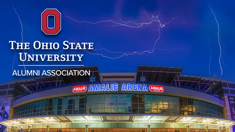 Amalie Arena lit up at night with cracks of lighting in the night sky and text reading The Ohio State University Alumni Association