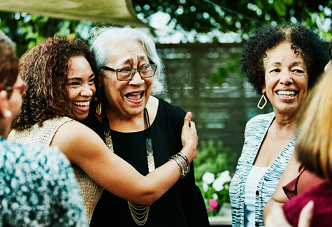 family smiling and hugging