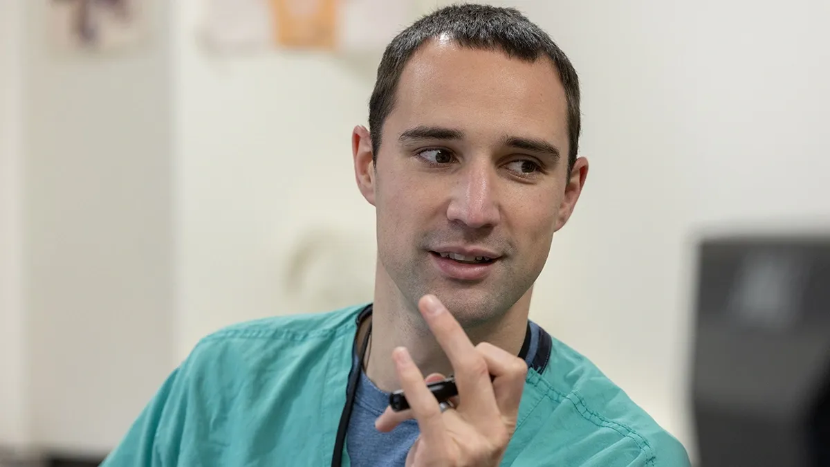 Aaron Craft in medical scrubs