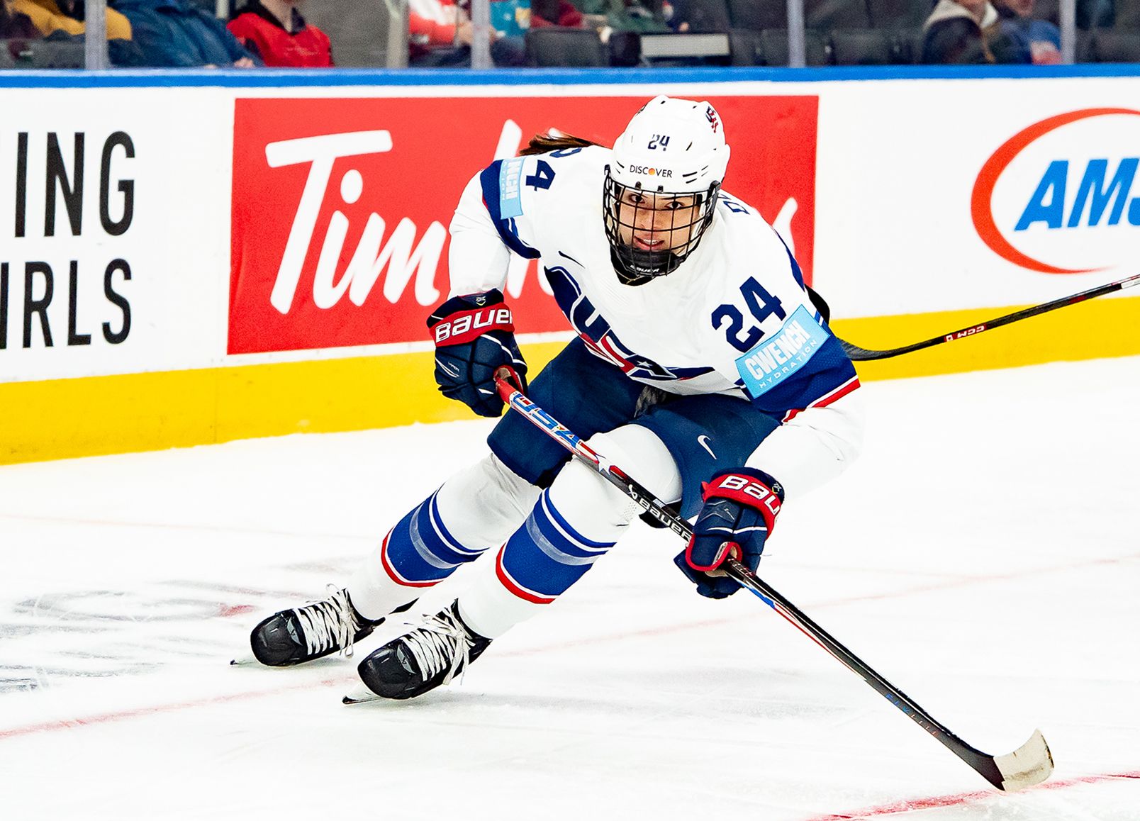 Ohio State hockey player Joy Dunne skating on the ice for Team USA