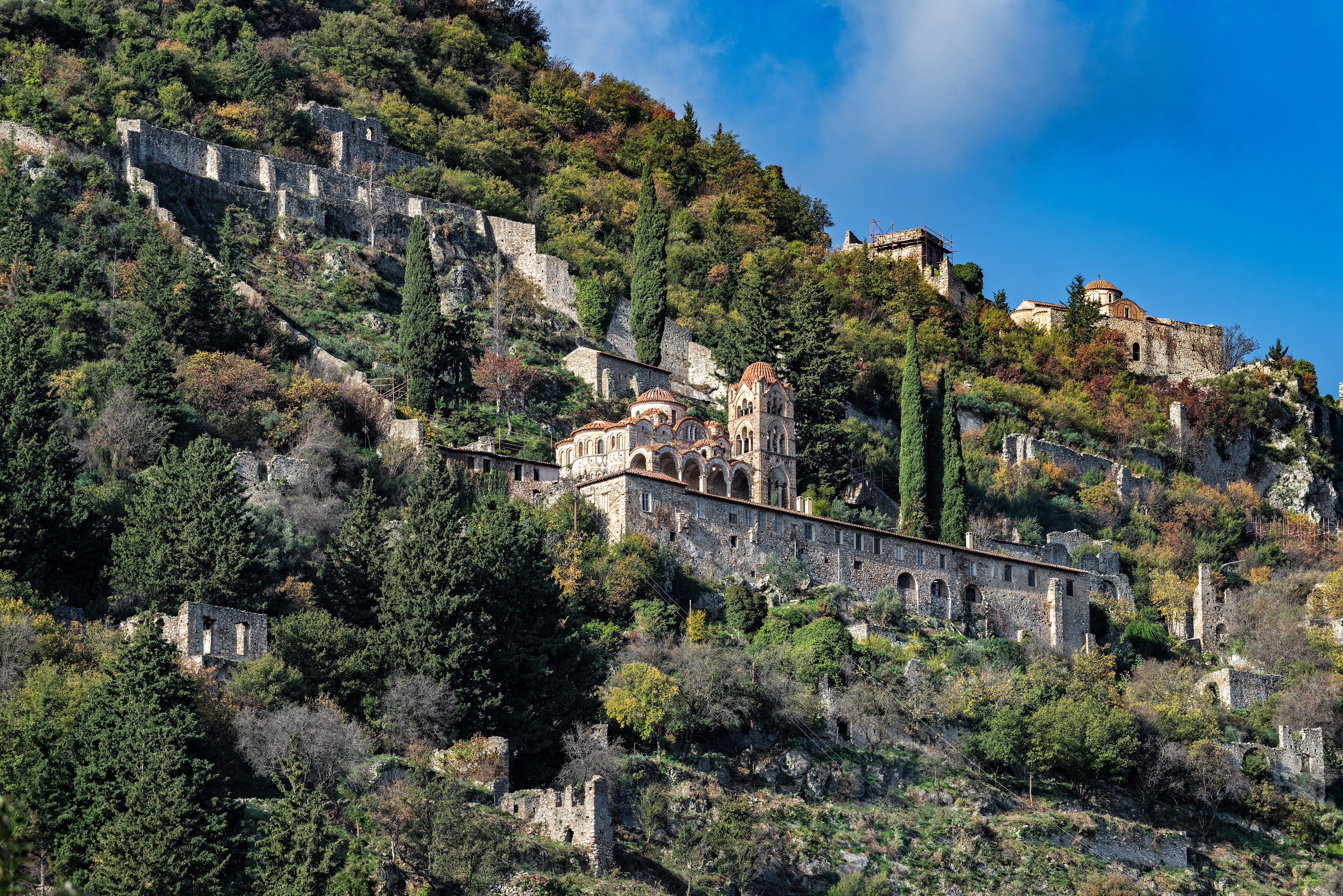 houses on a cliffside in Mystras, Greece