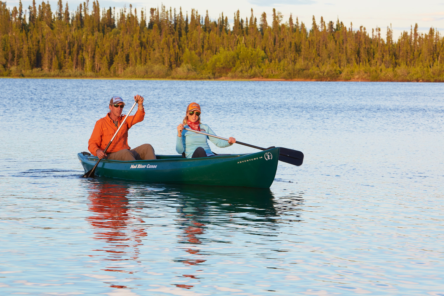 two people canoeing 