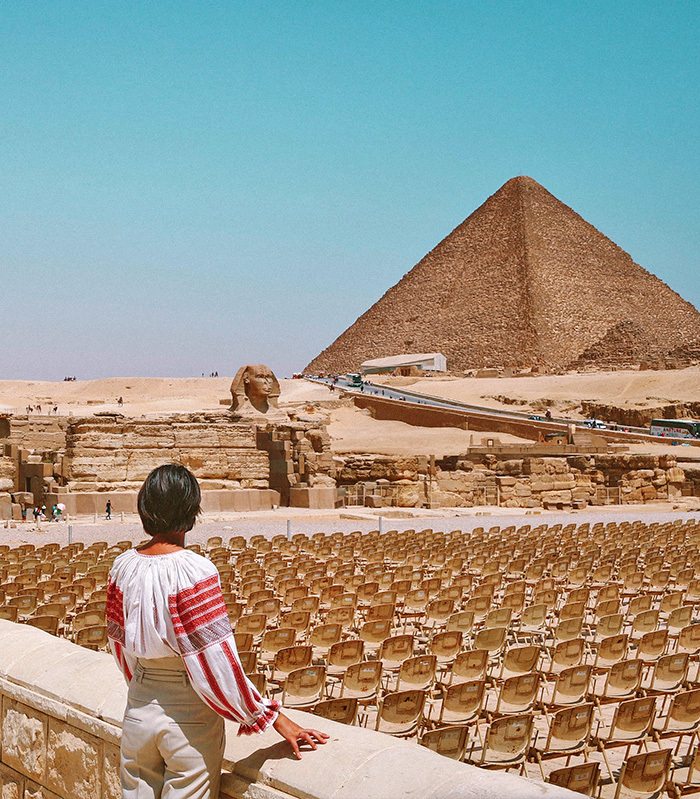 girl looking at pyramid