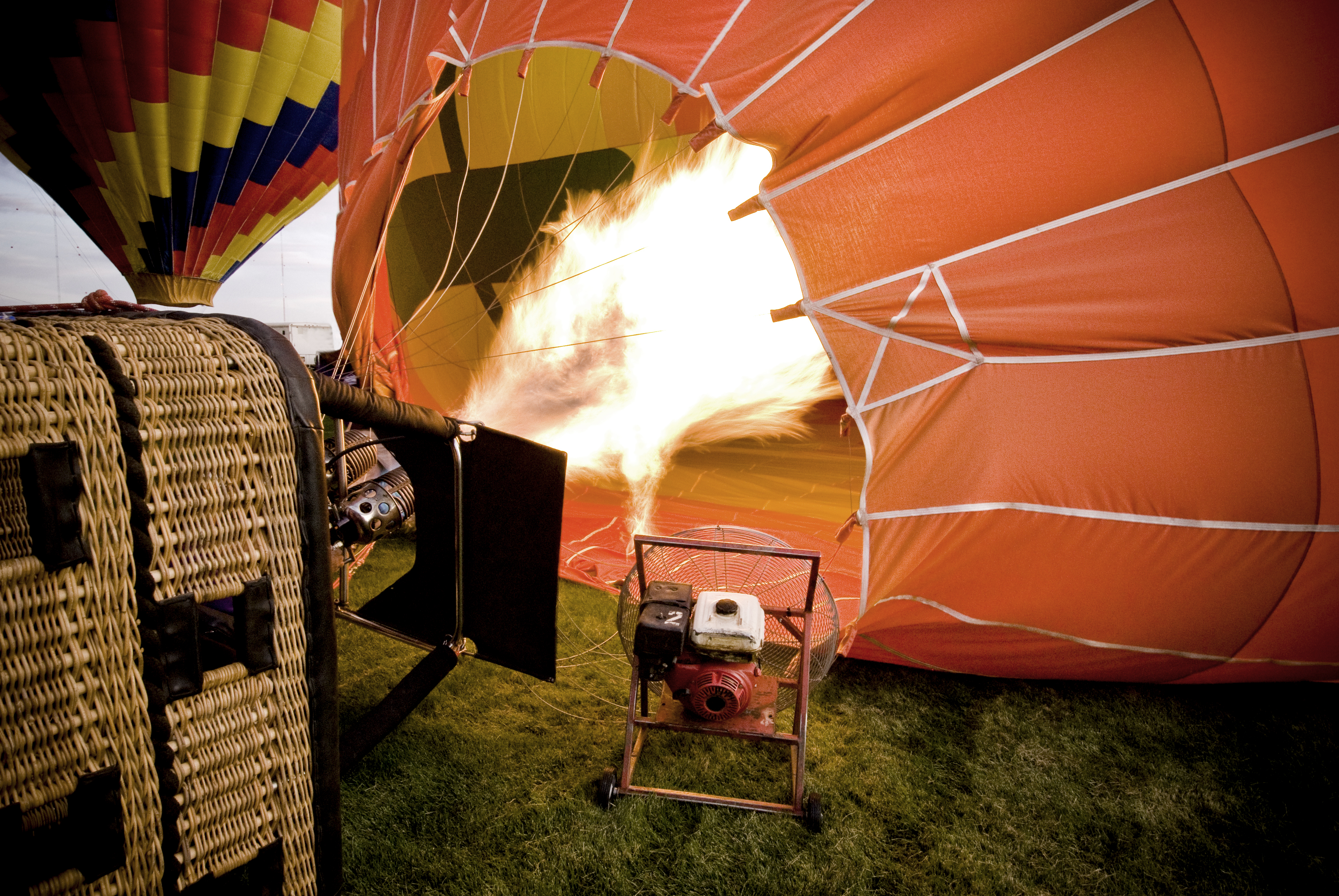 hot air balloon inflating with flame