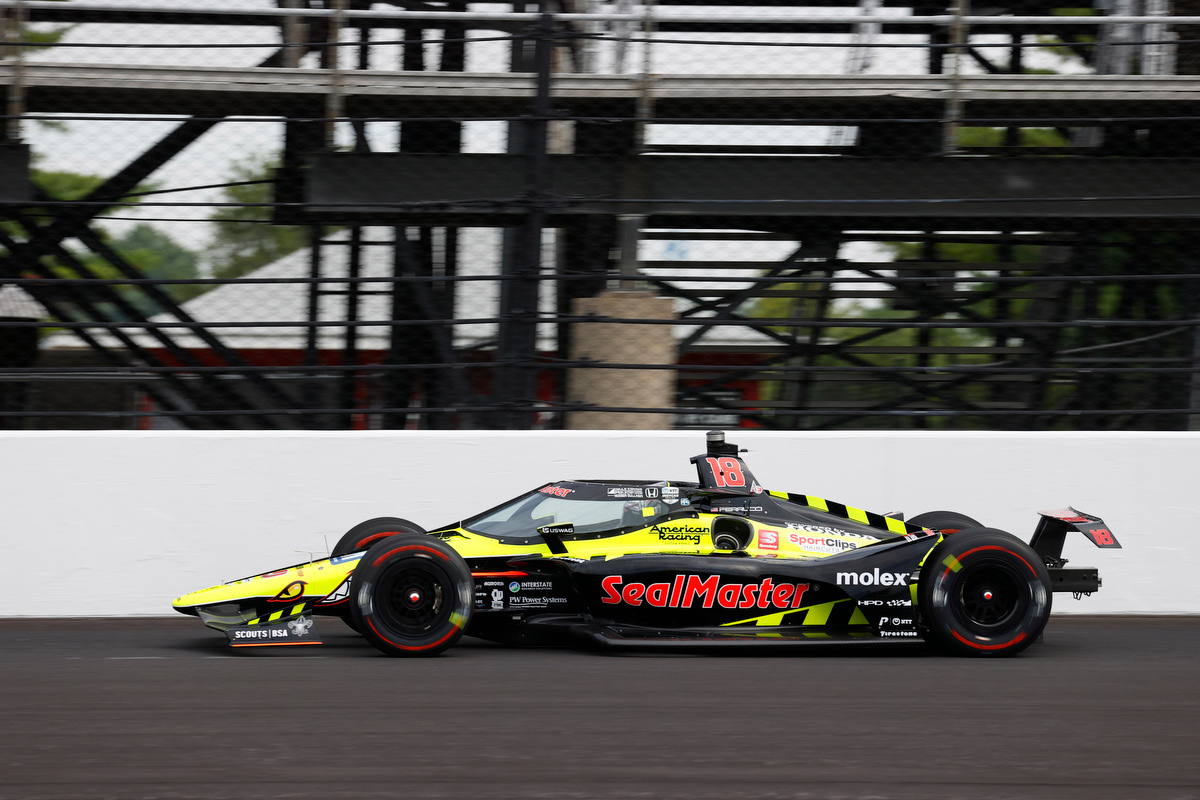 Side view of Indy car on track