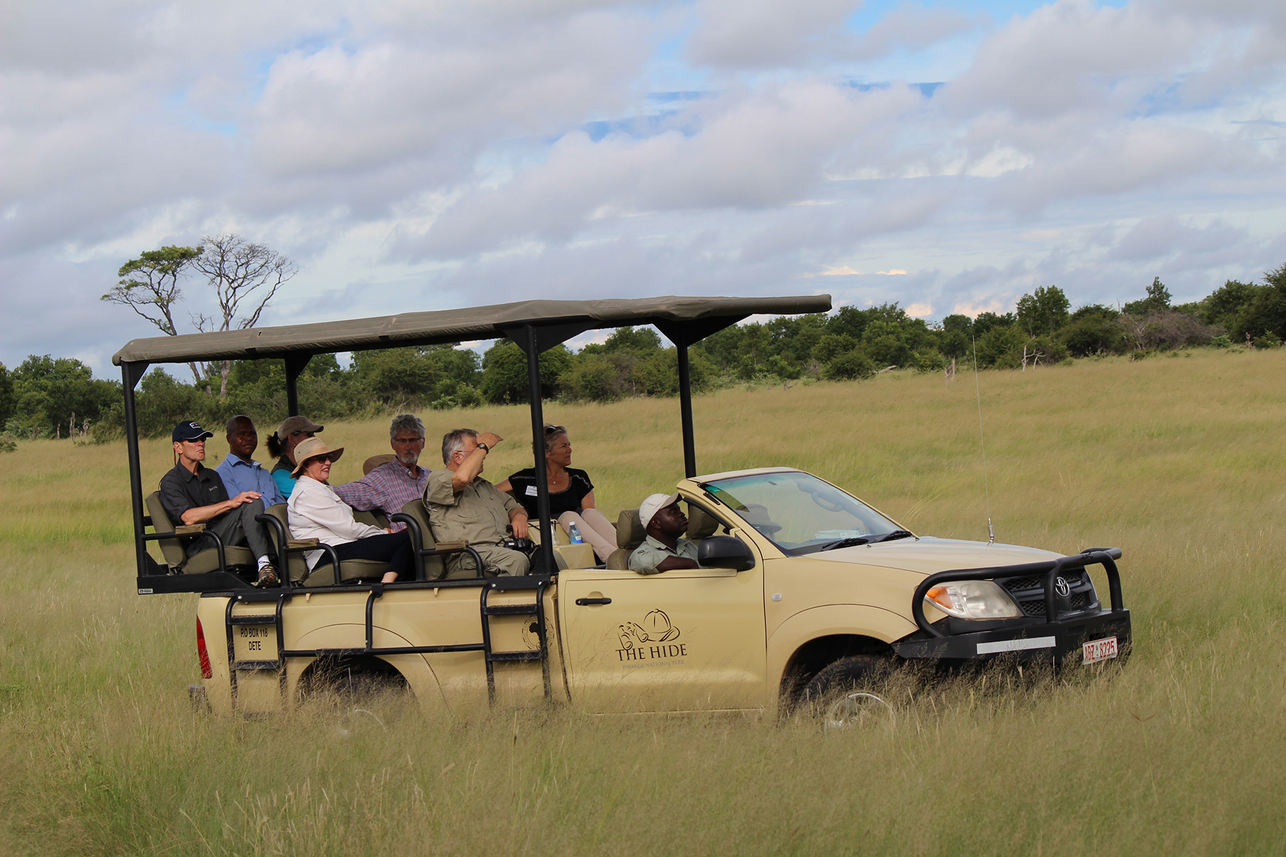 Safari truck with travelers