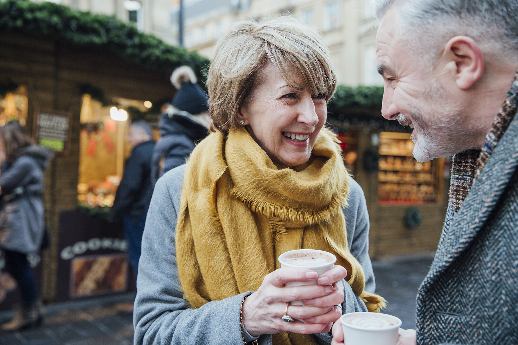 Two travelers enjoying a hot beverage on the Holiday Markets tour