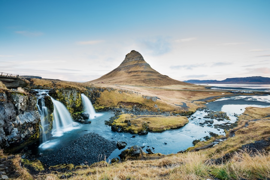 a large peak overlooking waterfalls