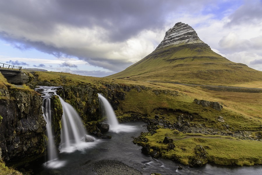a large peak overlooking waterfalls
