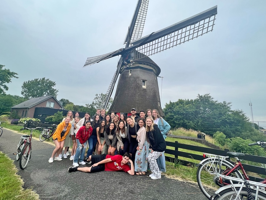 Group photo in front of a windmill in Holland