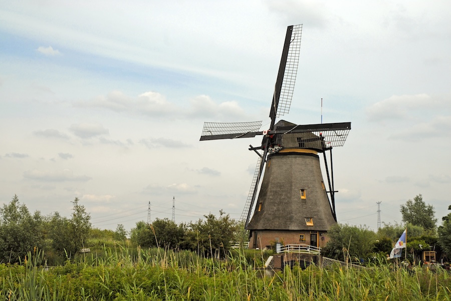 Windmill in a green pasture