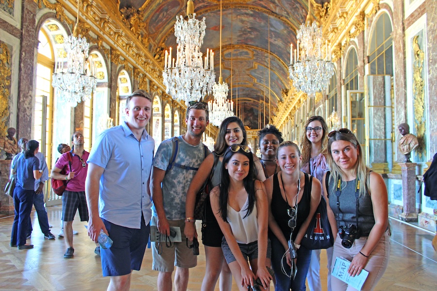 Group of travelers in Versailles in Paris