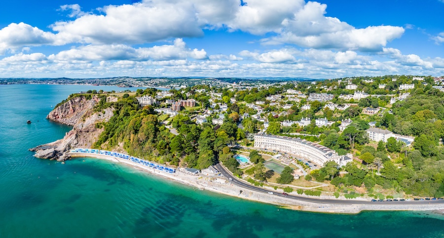 The turquoise waters and green coastline of Torquay