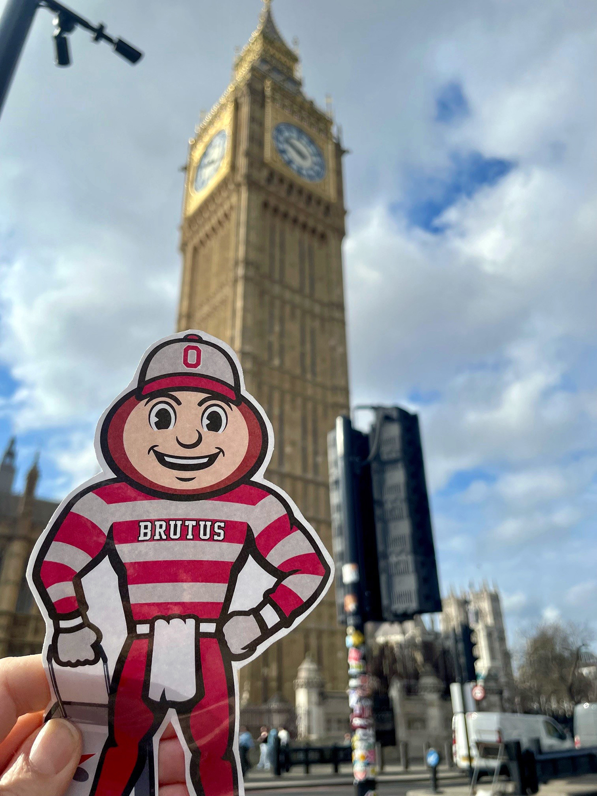 cut out of Brutus Buckeye in front of the Big Ben clock tower