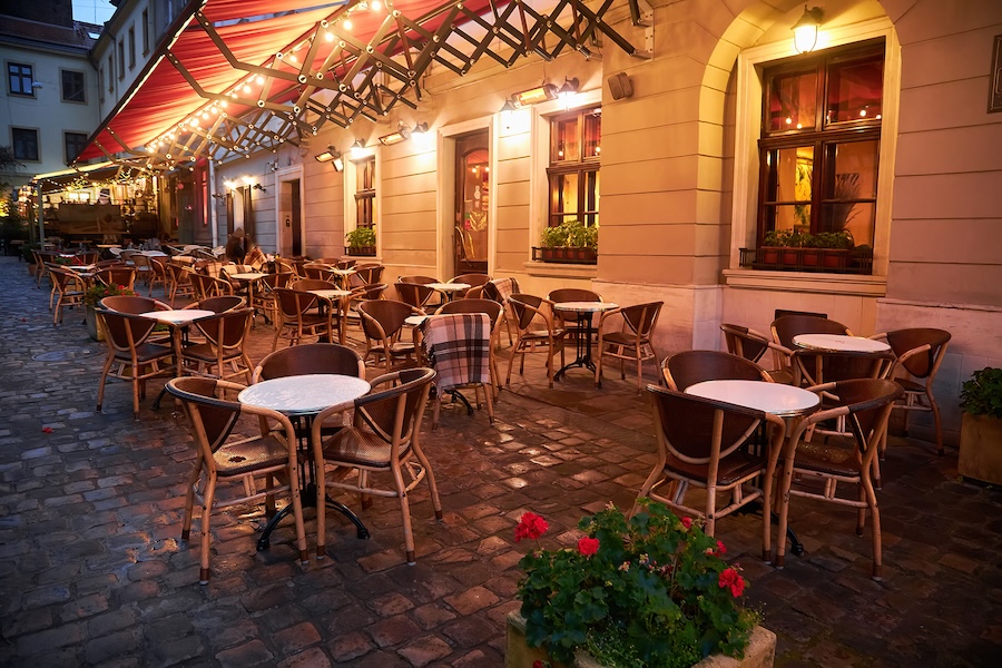 Outdoor hightop round tables at a restaurant