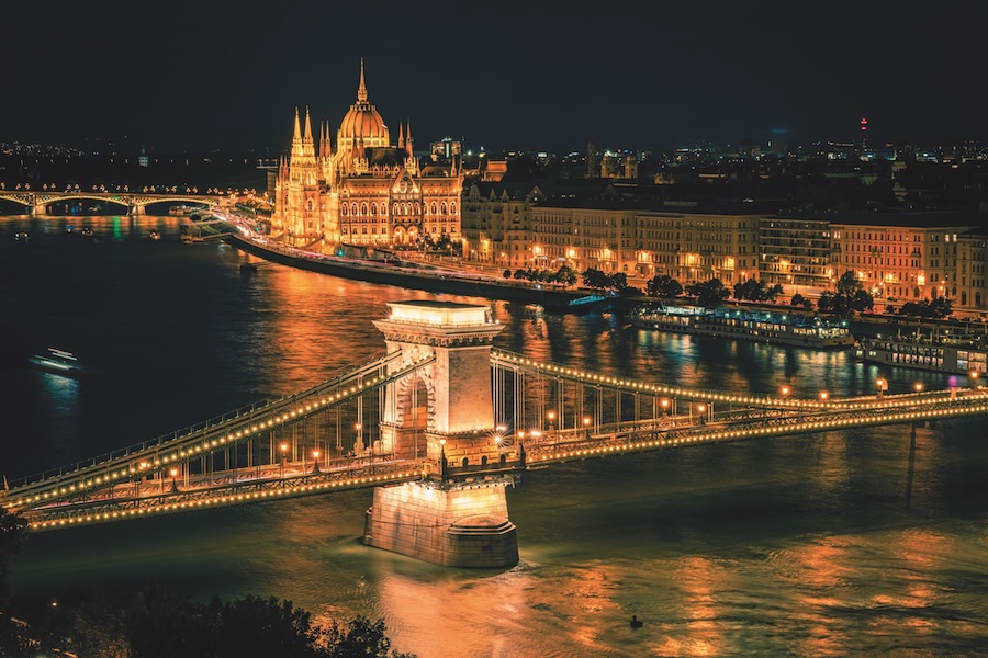 Budapest suspension bridge lit up at night