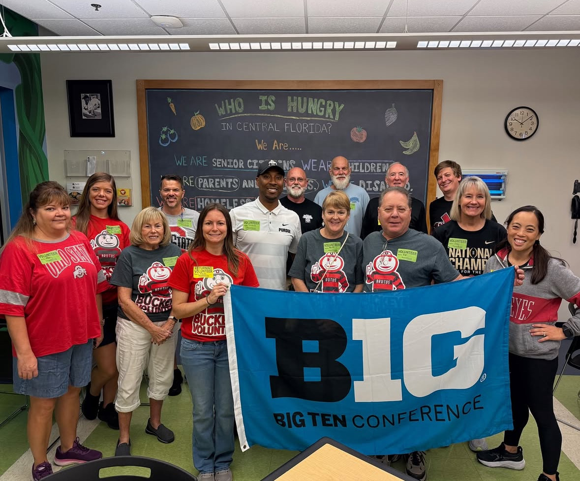 dozens of Buckeye volunteers pack food in central Florida