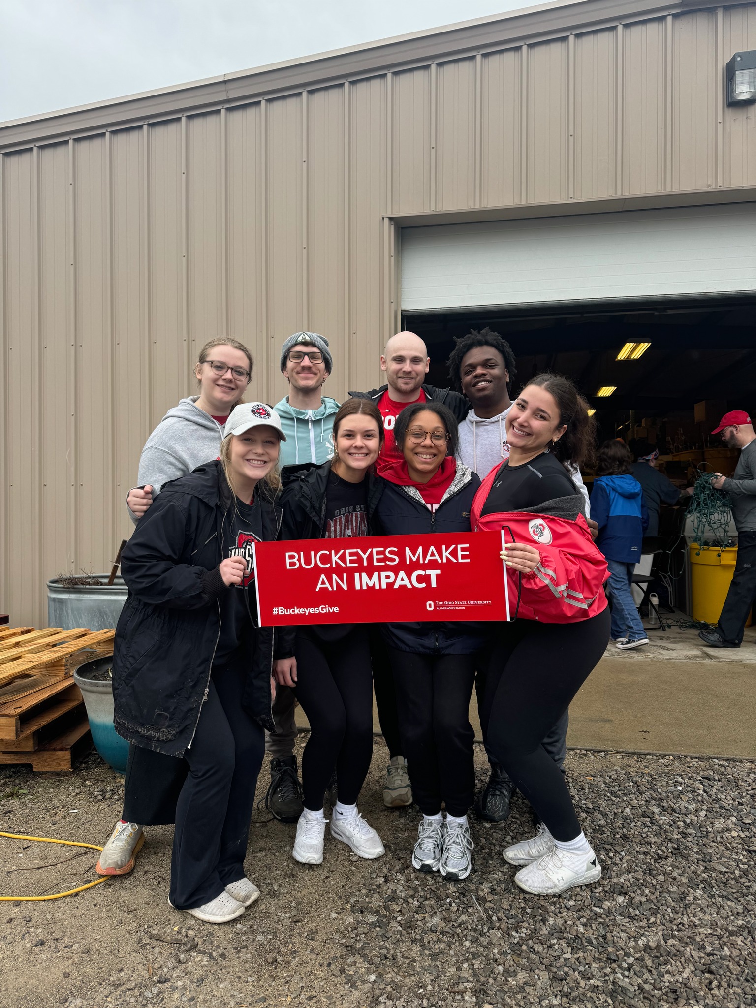 Eight Buckeye volunteers help take down Christmas lights at the Columbus Zoo