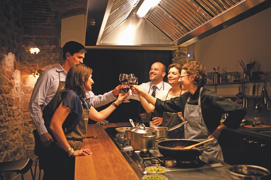 Travelers taking a cooking class