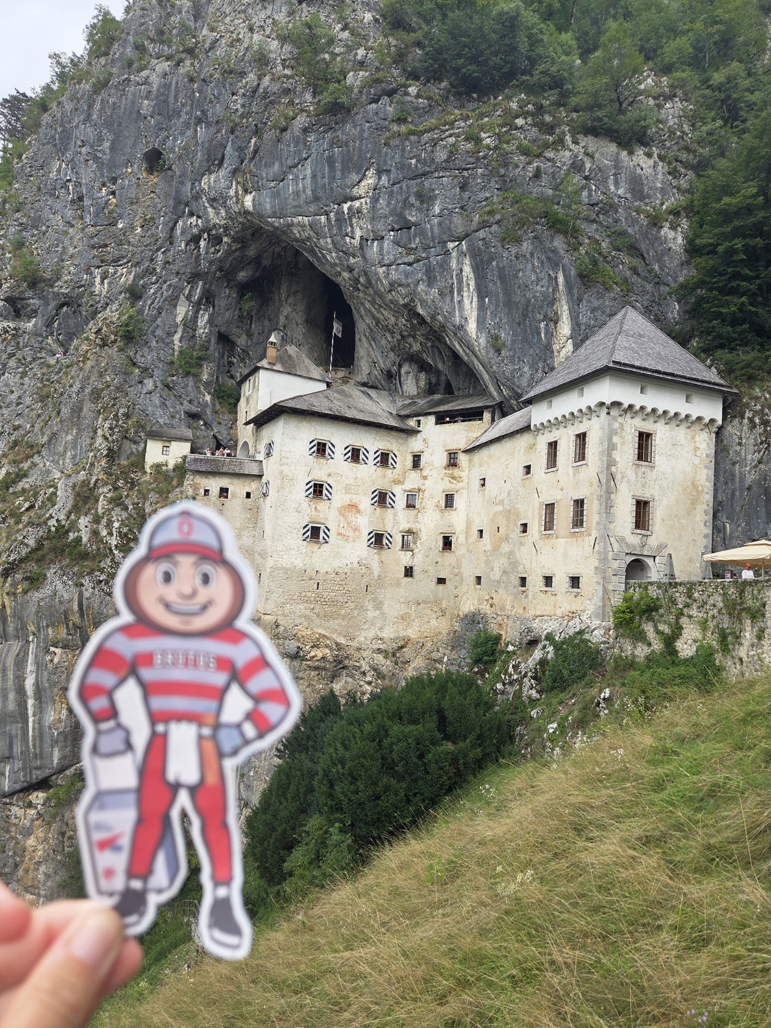 Brutus in front of the Predjama Castle in Postojna, Slovenia.