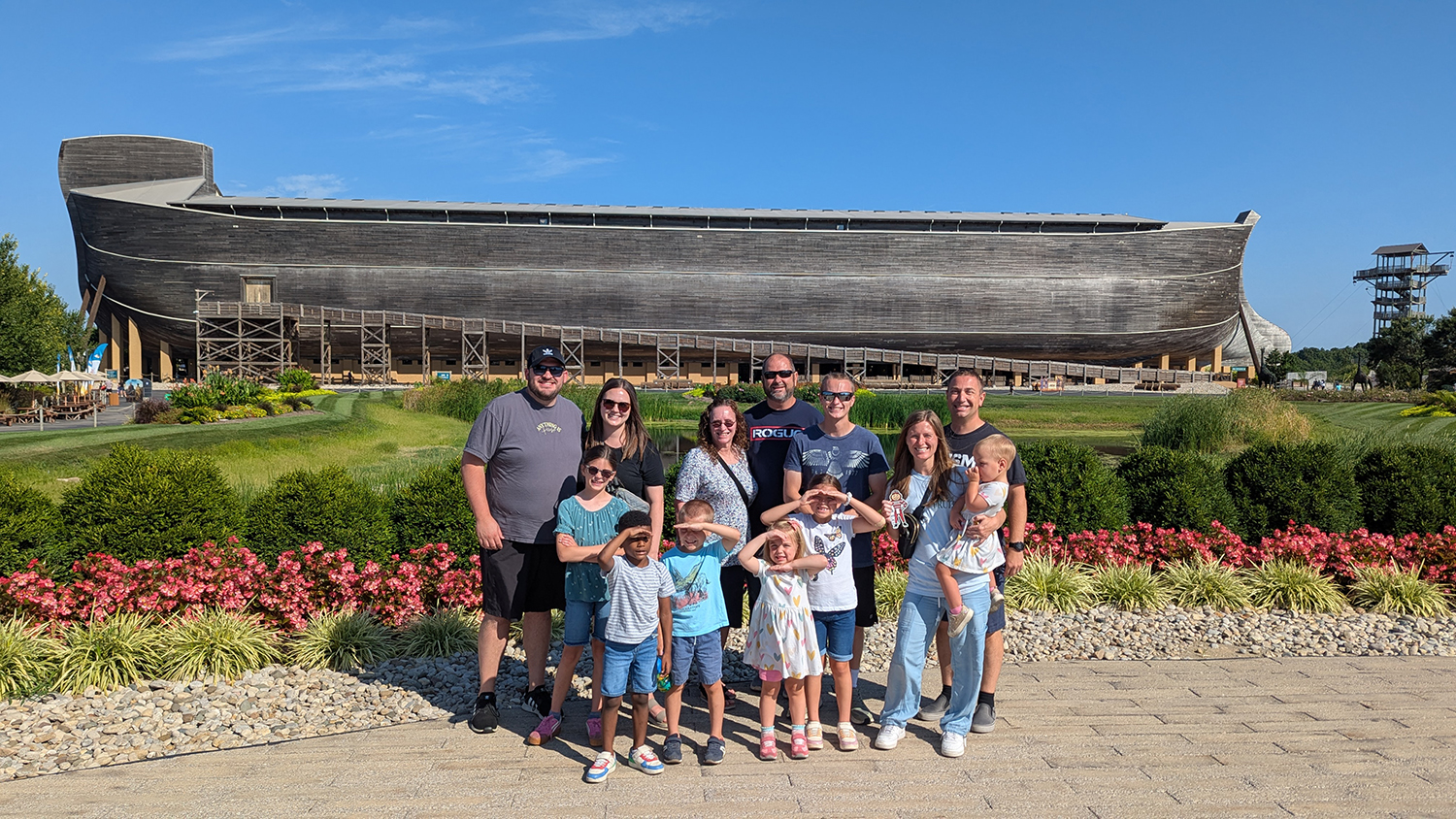 Seven adults and six children with Brutus in front of the Ark Encounter in Williamstown, Kentucky.