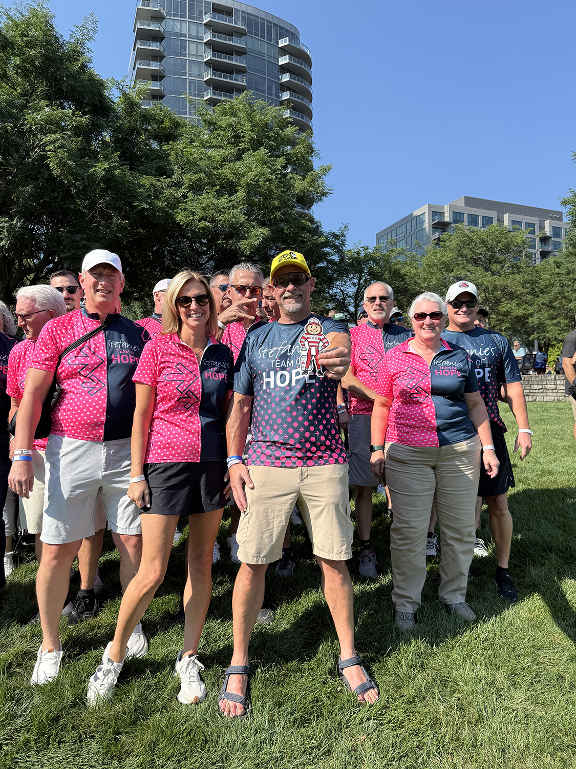 A group of individuals wearing Stefanie’s Team of Hope shirts, getting ready for Pelotonia in Columbus, Ohio.
