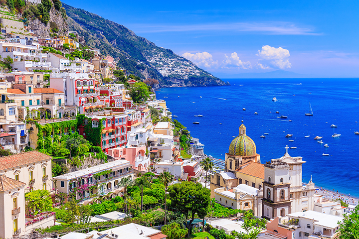 Colorful hillside buildings of Positano overlooking the Amalfi Coast.