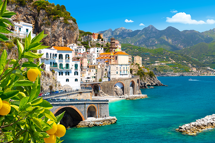 Cliffside village along the Sorrento coast above turquoise water.