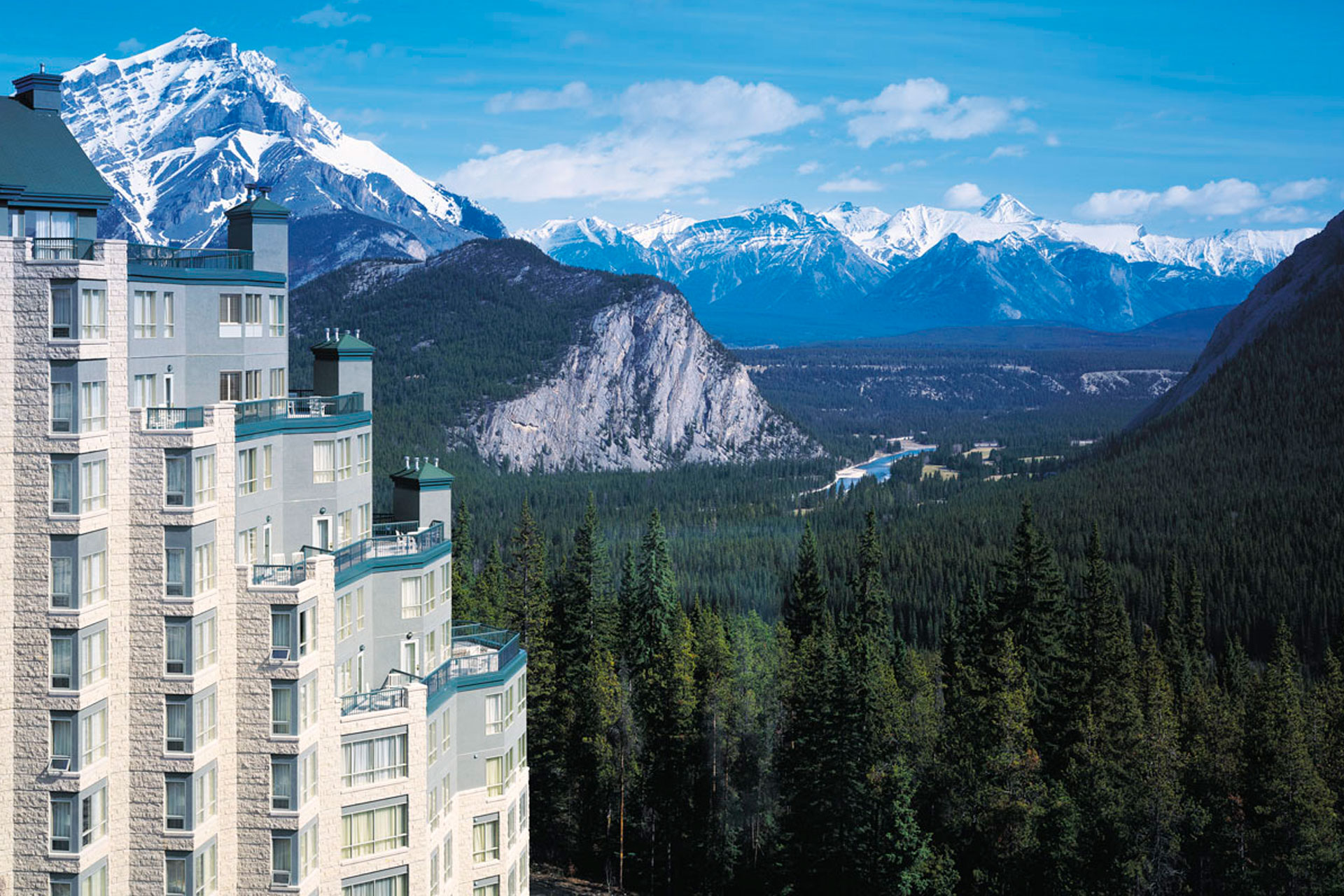 The Rimrock Resort Hotel perched high above Banff with panoramic views of the surrounding mountains.