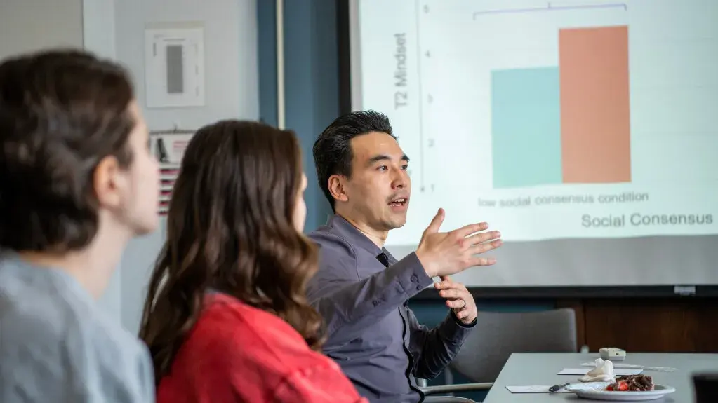 Ken Fujita, professor in the Department of Psychology, during a lab meeting with students