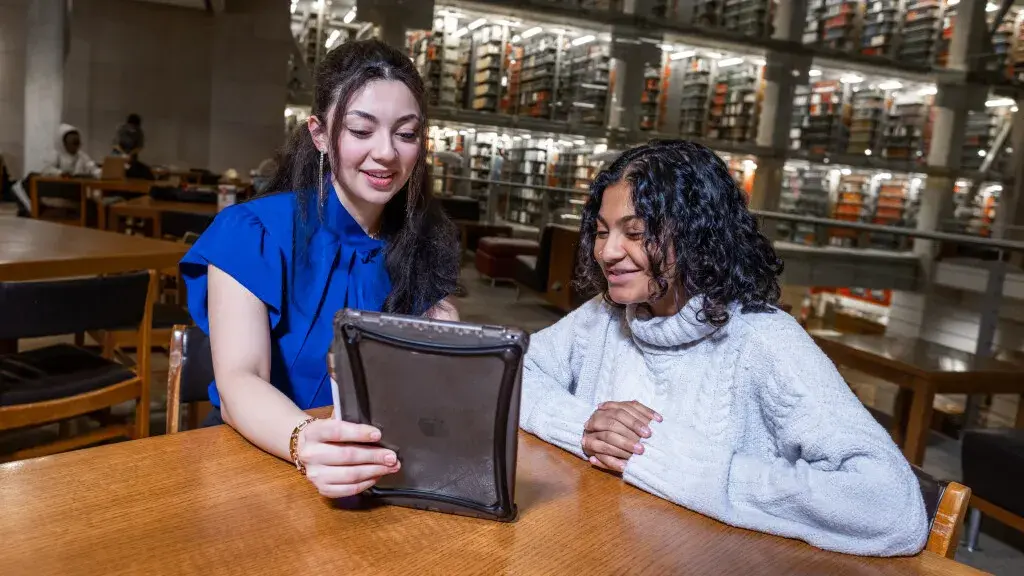 Pelorus Health founder Anjali Prabhakaran ’22 (white sweater), part of the Buckeye Accelerator group, and her business partner Angelina Atieh (a third year student) at the Thompson Library.