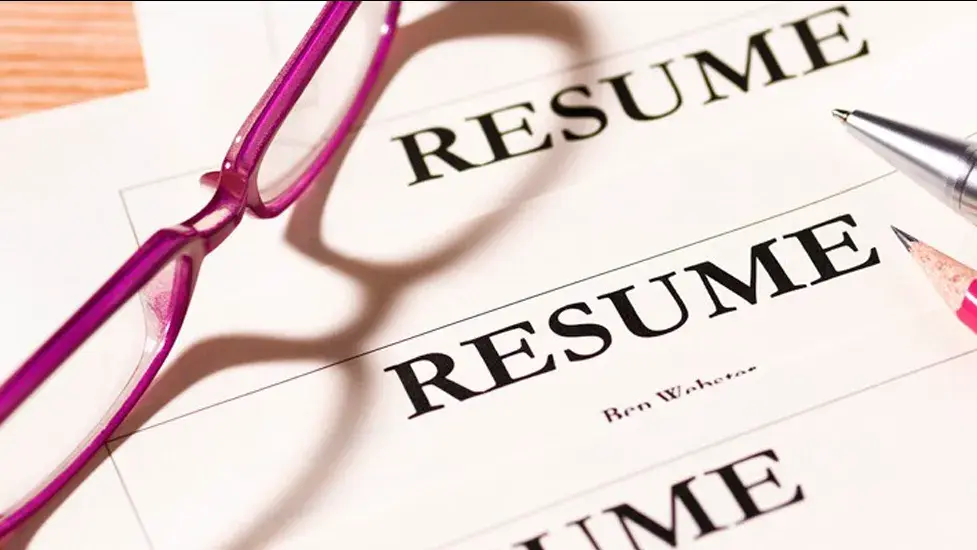 a stack of resumes