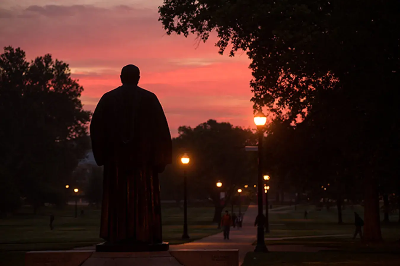 Campus statue at dusk
