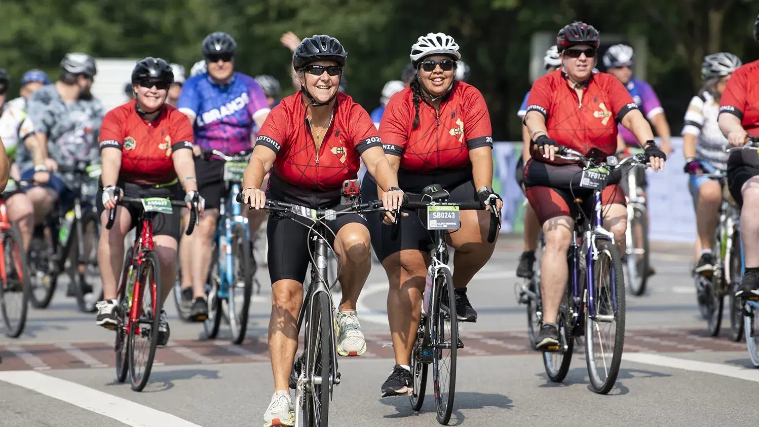 two women riding bicycles