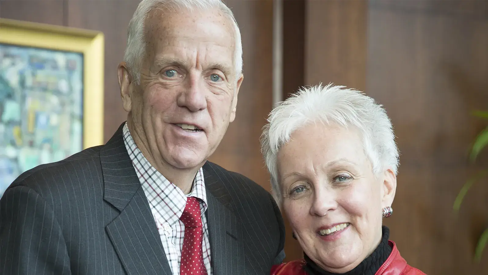 man and woman smiling