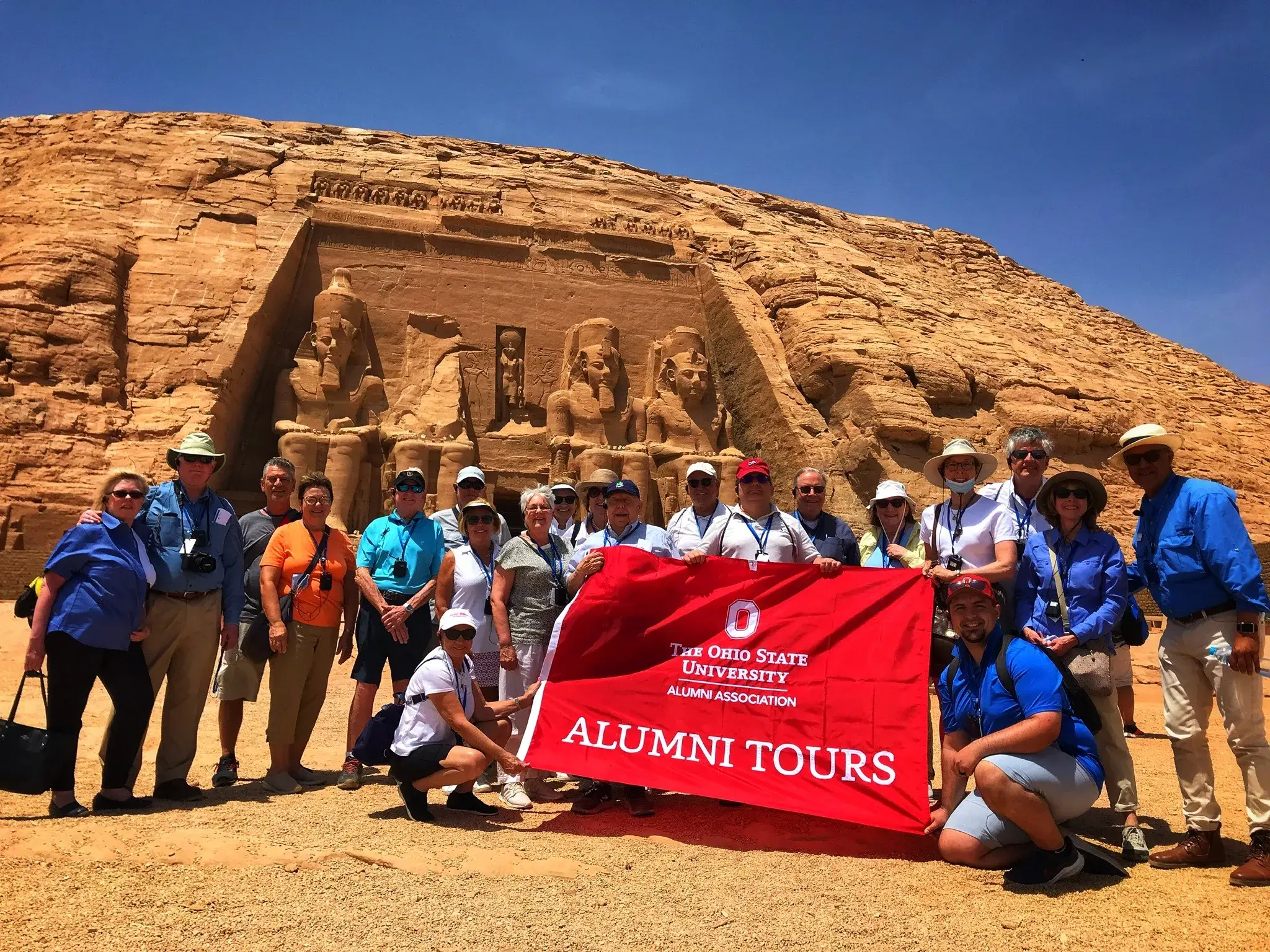 dozens of people gather outside Abu Simbel in Egypt