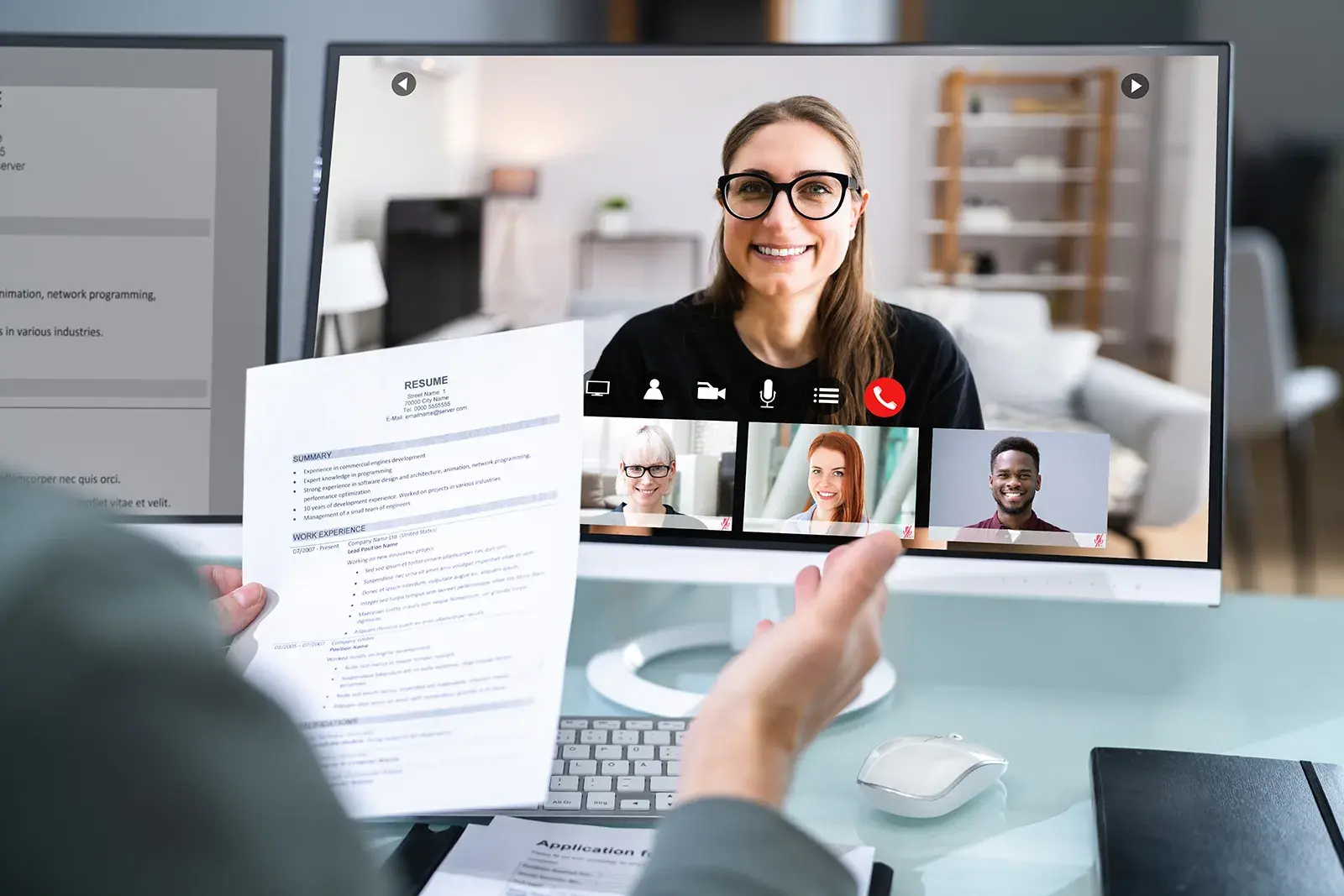 person conducting a virtual interview on a computer screen