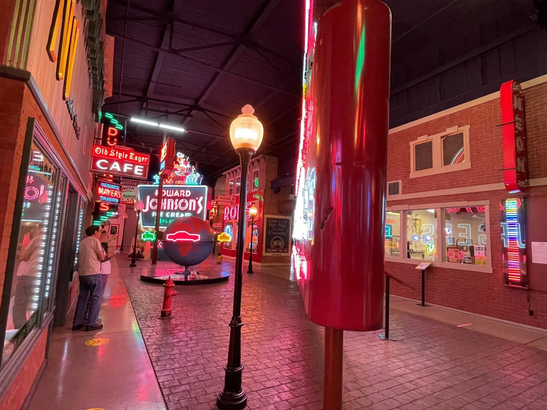 Two people exploring the American Sign Museum