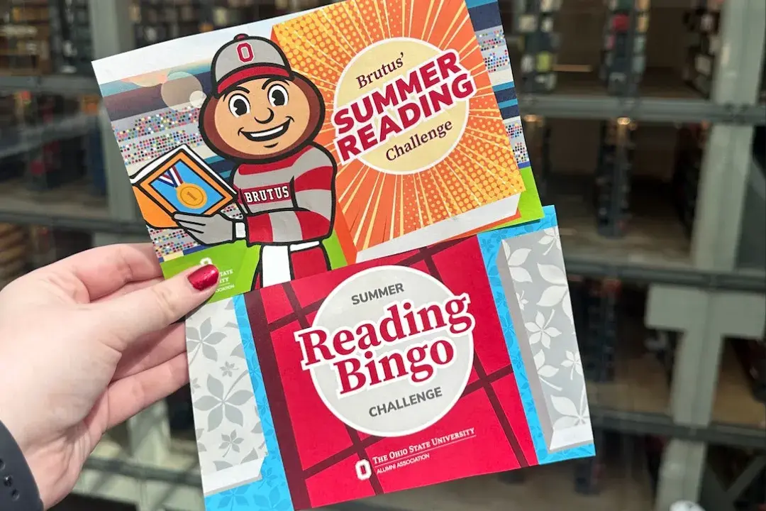 postcards depicting an illustration of Brutus Buckeye with the words summer reading challenge in colorful text