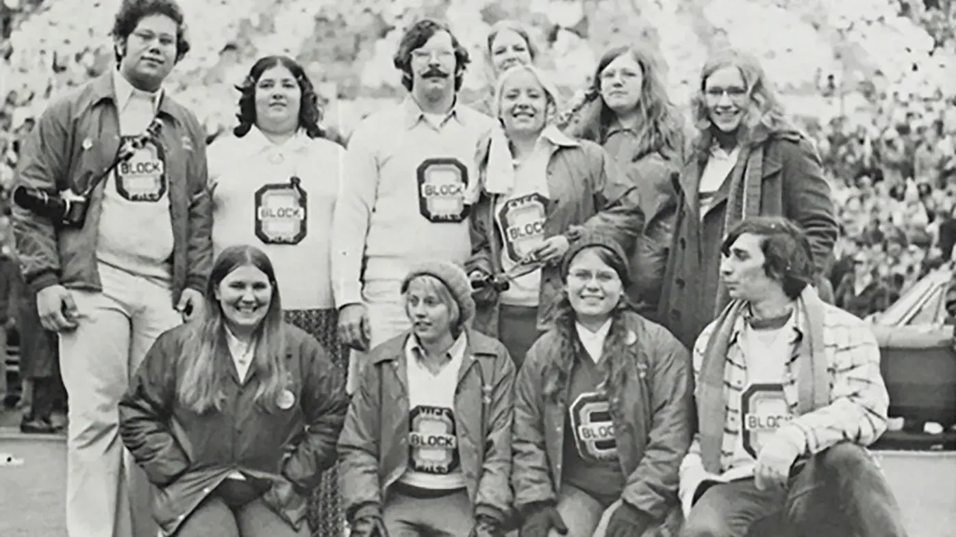 old black and white photo of alumni block o club