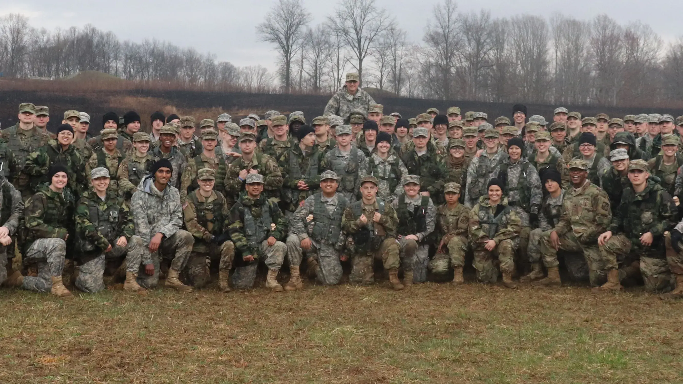 ROTC students standing in formation for a photo outdoors