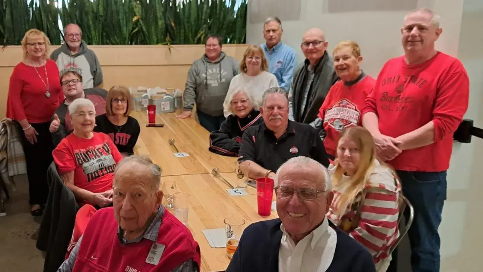 group of ohio state alum sitting at a dinner table