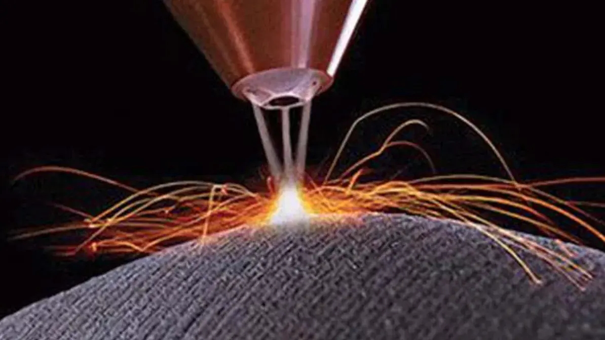close up picture of a welding machine making sparks