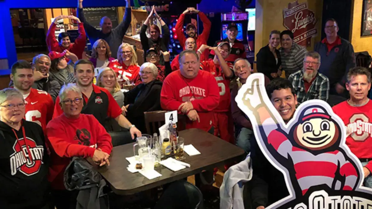 Ohio State alumni at a restaurant without a large cutout of brutus buckeye