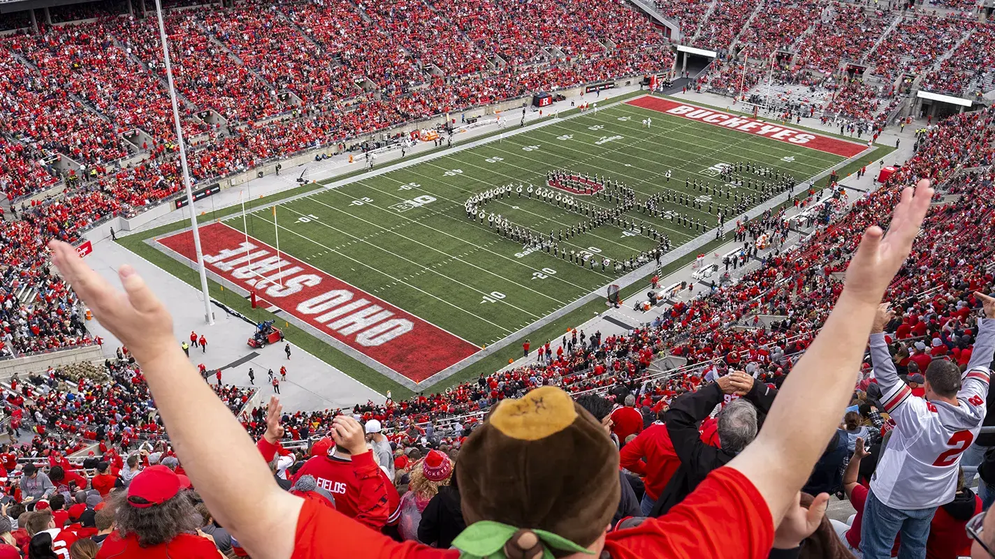 aerial image of osu marching band performing script ohio