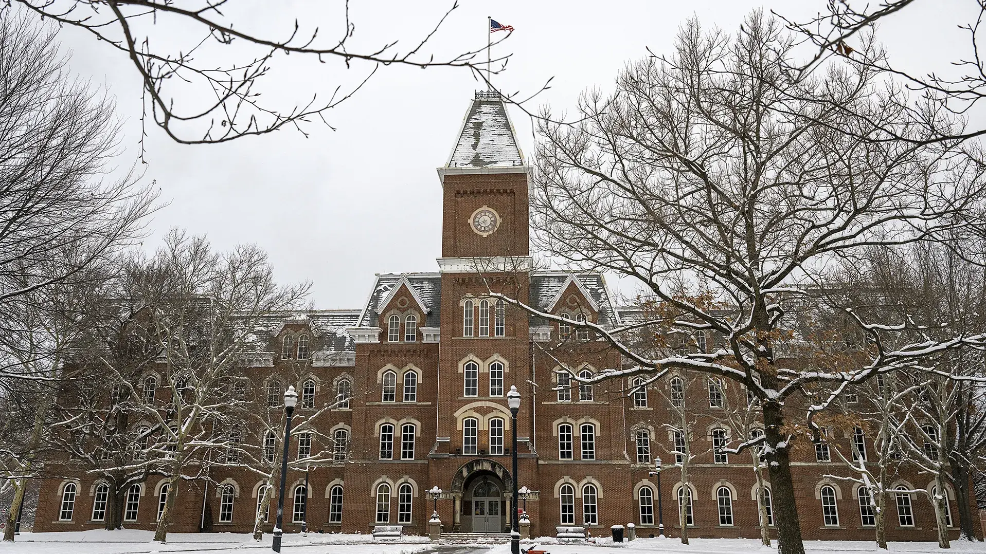front view of university hall on osu's campus in the winter