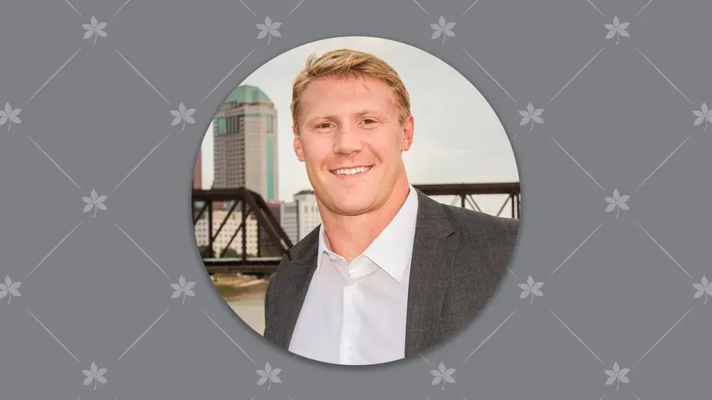 professional headshot of bobby carpenter who is a blonde-haired man wearing a gray sports coat