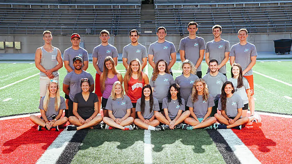 Dunn Scholars posing for a picture on the block O in the horseshoe