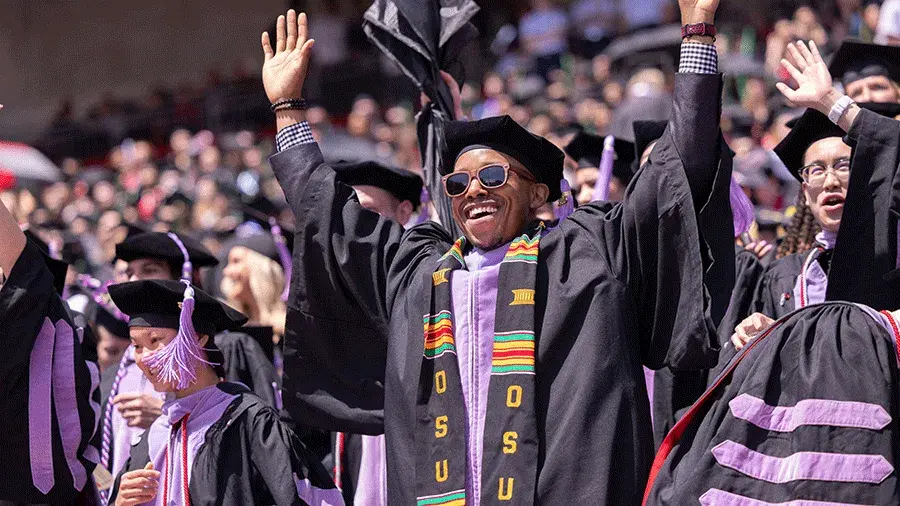 group of graduates in the stands at the ceremony